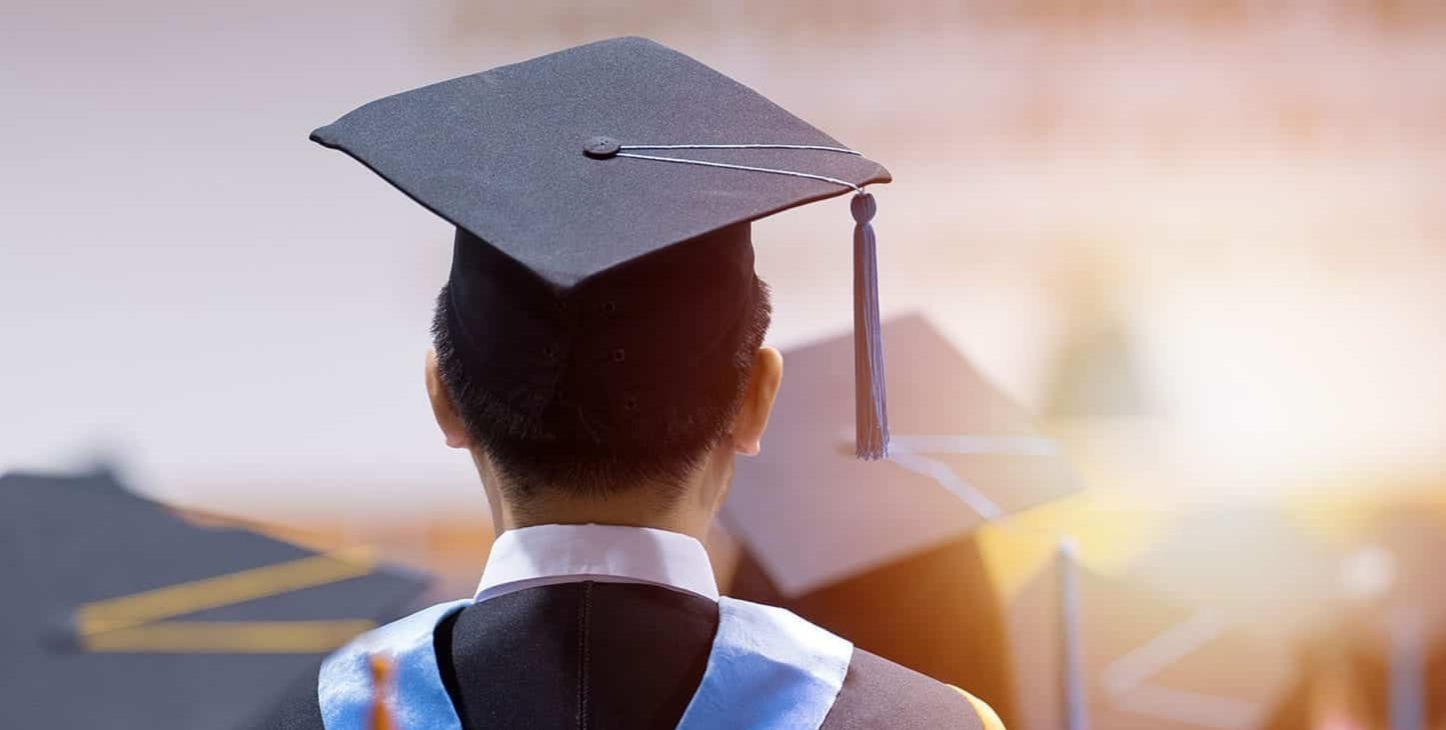 A diverse group of students at graduation